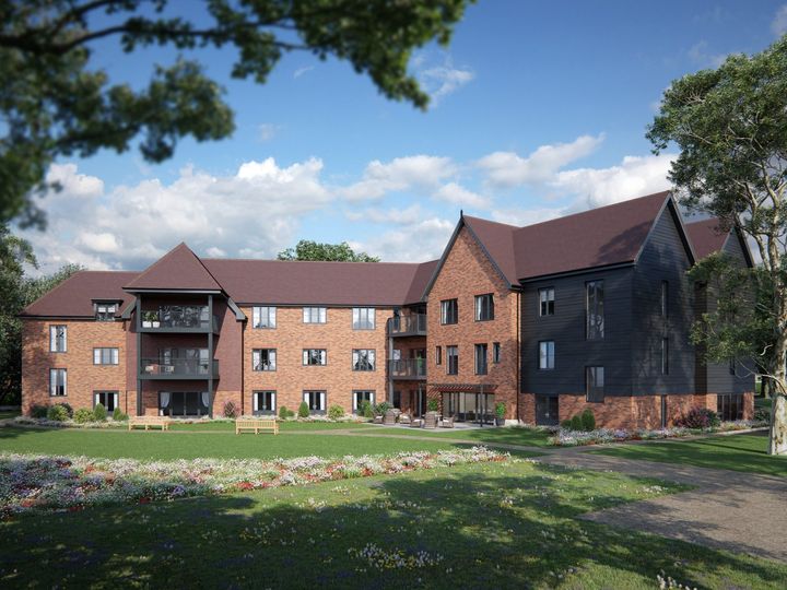 CGI of the Kings Hill development, a three-storey brick and dark-clad care home set behind a lawn